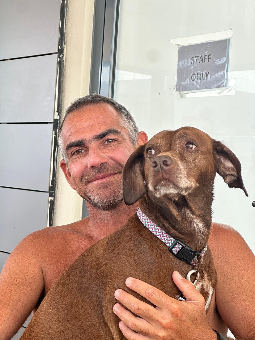 Pedro with his dog Bala, the heart and soul of the school